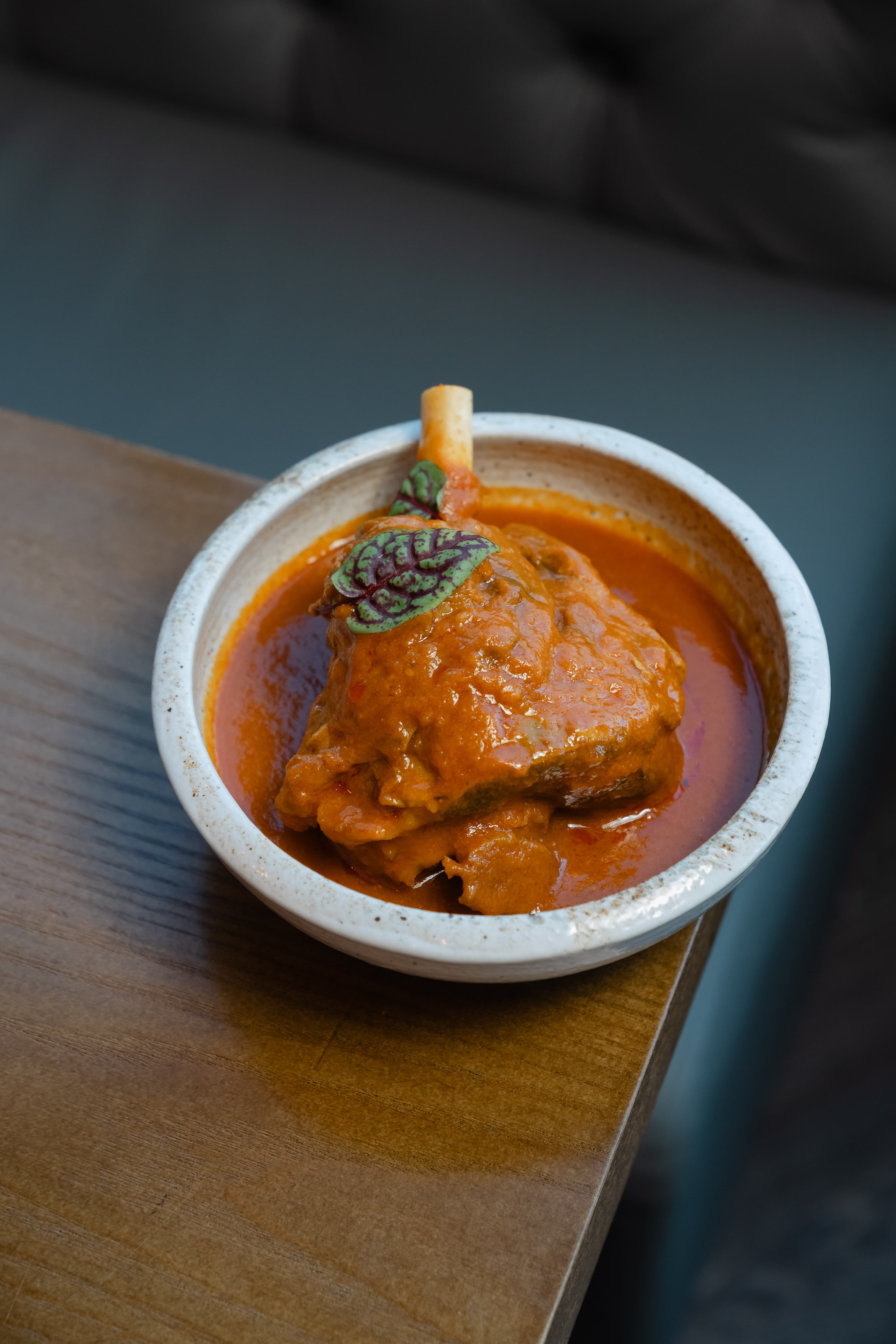 Lamb Shank Nihari - signature dish at Koyal Indian Restaurant, Surbiton