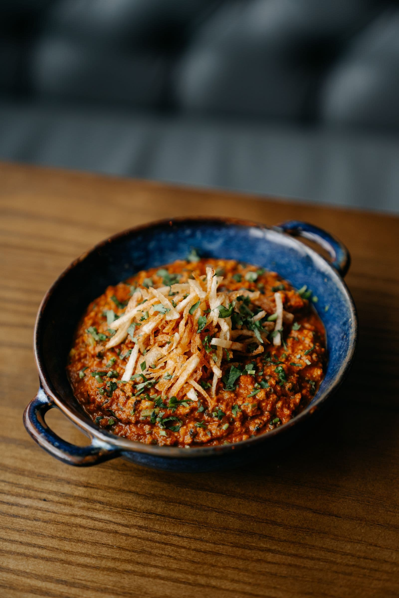 Slow-cooked curry in a clay pot
